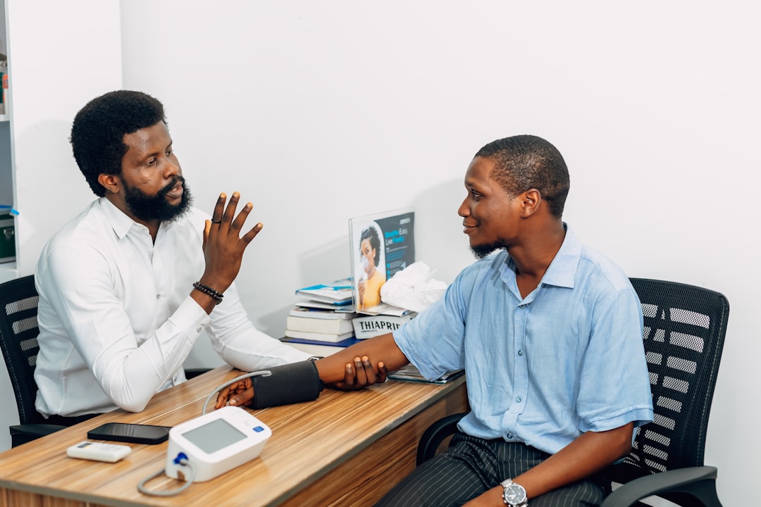 Patient speaking with a healthcare professional during a medical consultation